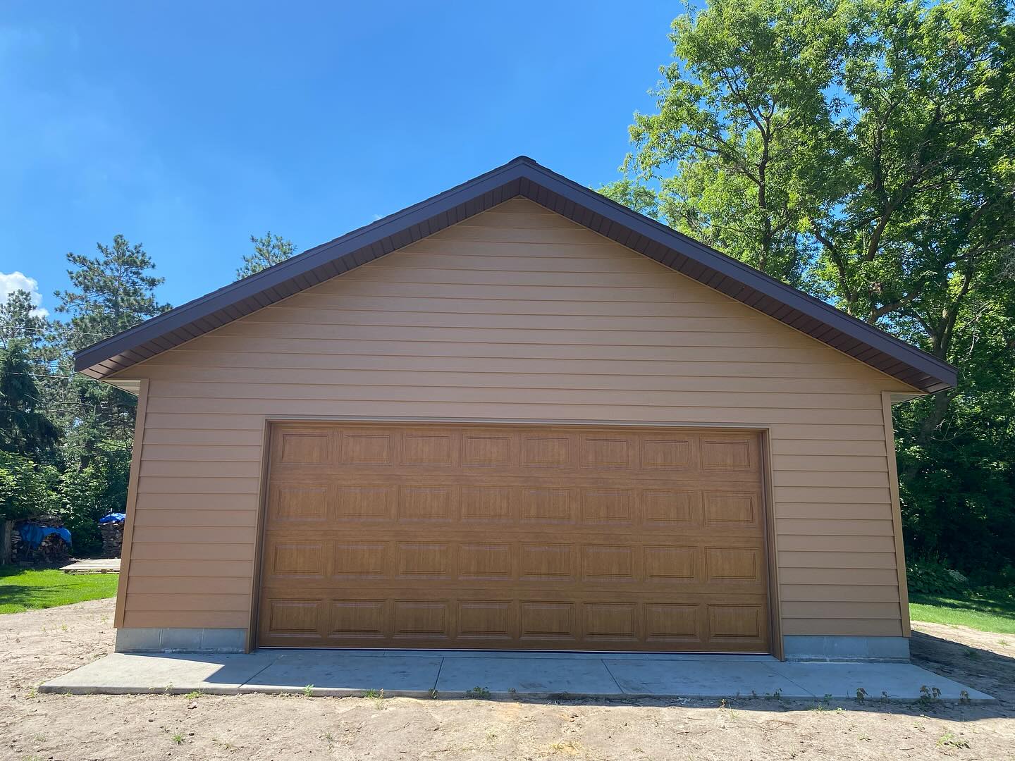 Completed three-car garage addition in St. Cloud